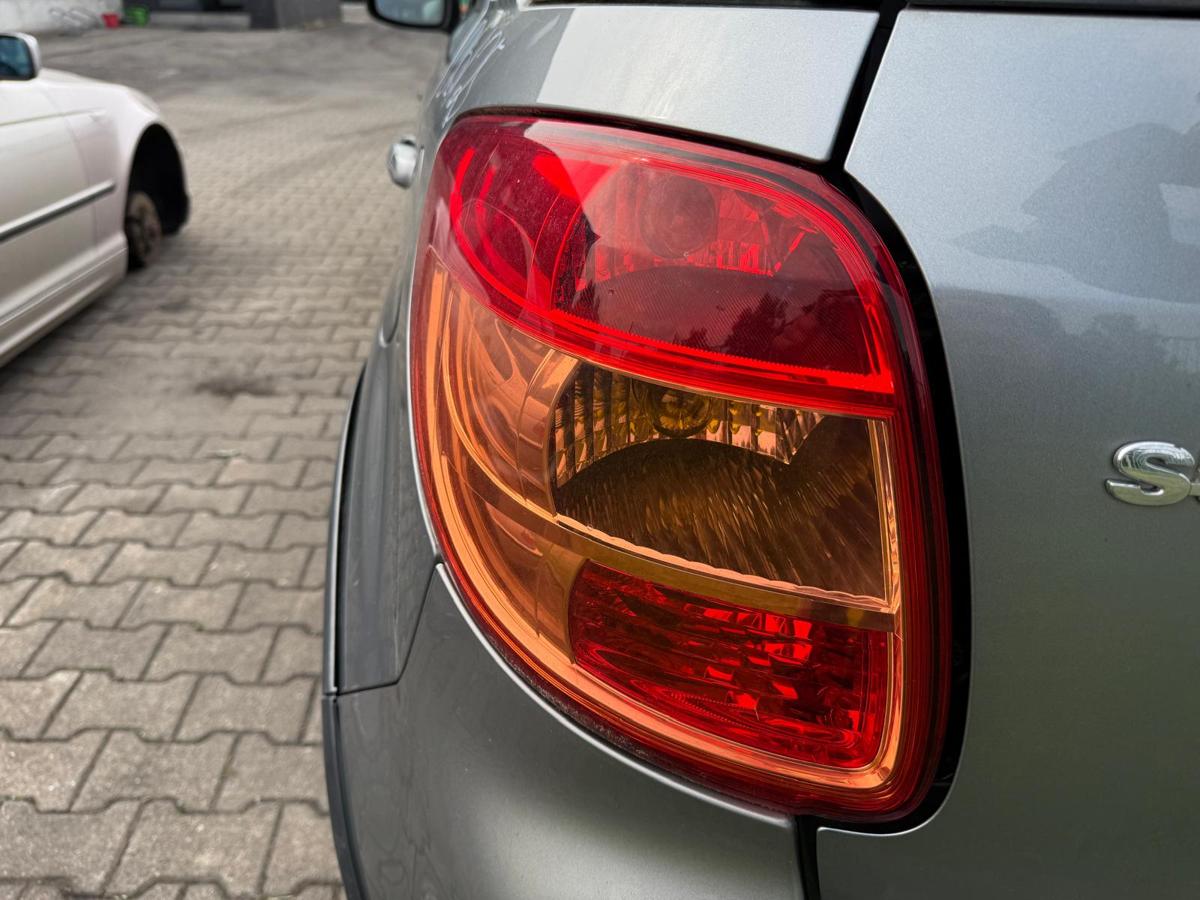Suzuki SX4 EY original Rücklicht Rückleuchte Schlussleuchte links BJ11
